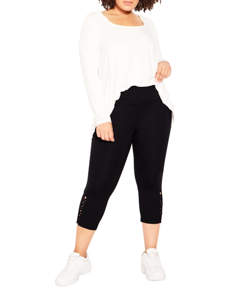 Front of a model wearing a size 18 LEGGING HEM CROSS in Black by avenue. | dia_product_style_image_id:293453